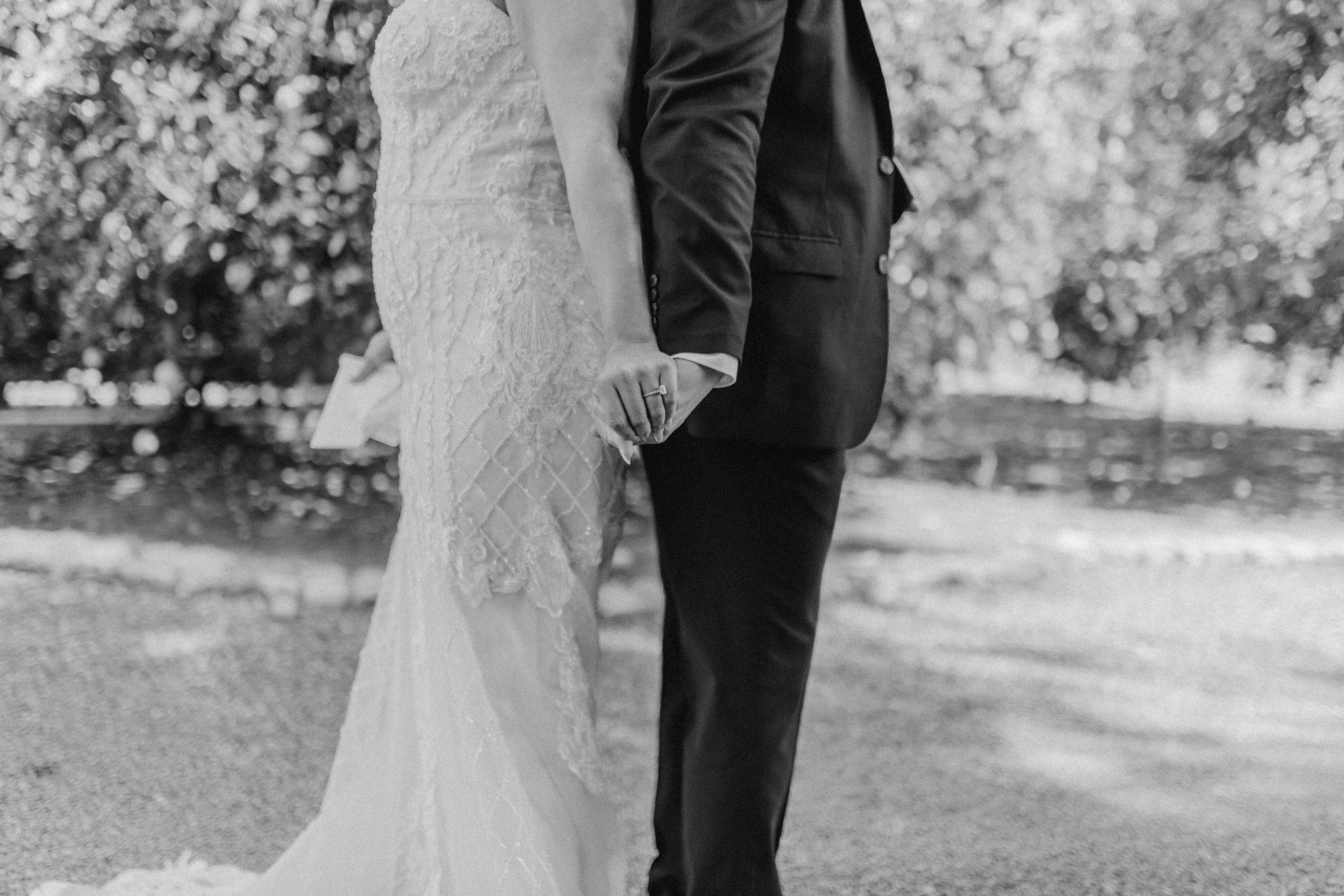 bride and groom holding hands during their first look